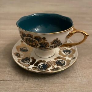 Anthropologie teacup with saucer